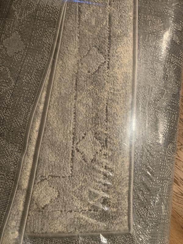 Sadly, this rug is not charcoal gray, as pictured, but a very pale gray which will show every stain and spot. Now I have to return it. It arrived in good condition and in a timely manner.