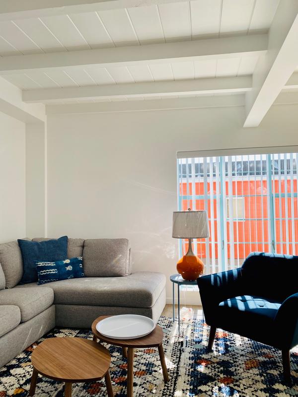 Vacay Rental Decor in Progress with pretty rug!