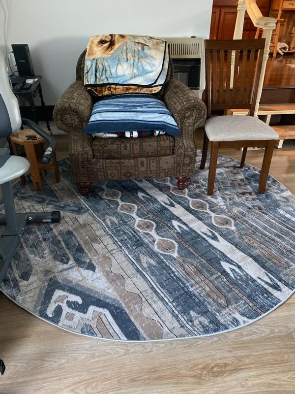 Beginning stages of redecorating my dad's house! The rugs were the first purchase, now to add new couches and window treatments!