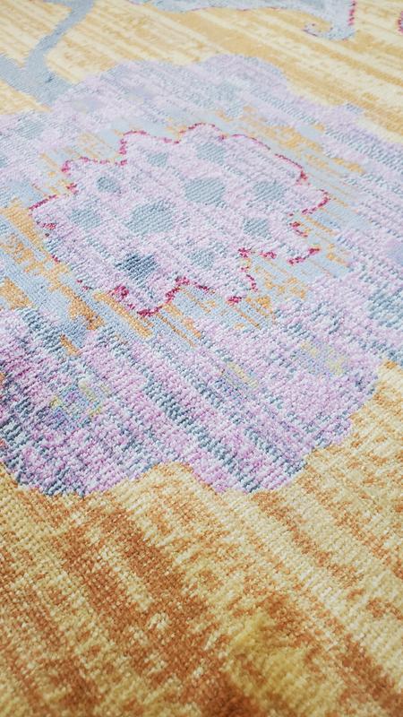 The center medallion is mostly pink