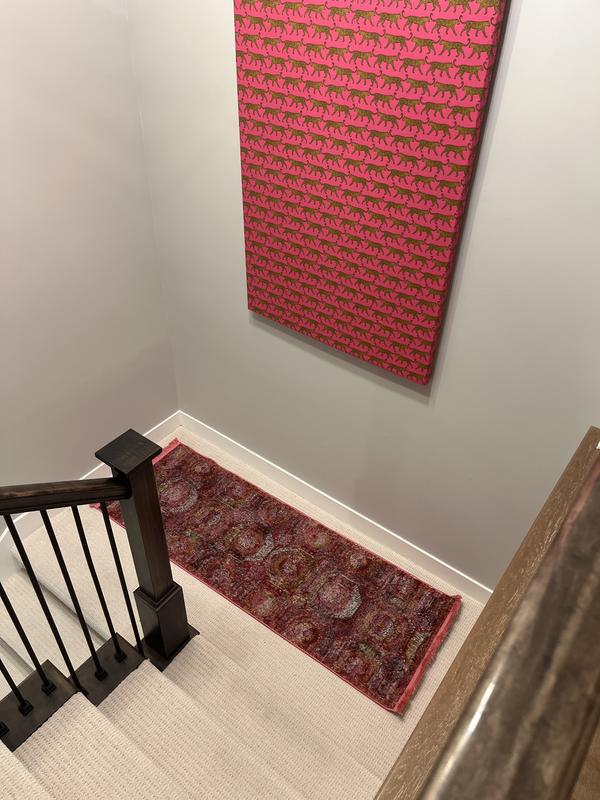 Bought a 3’3 square rug to match for the bottom landing of our basement stairs. Will probably buy another runner or rug of some sort in Santiago for our front door.
