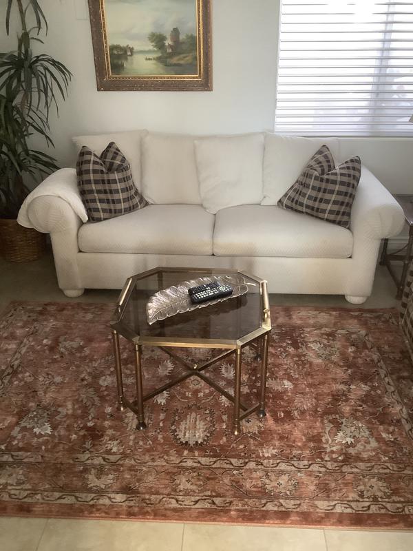 Beautiful orange rug in my den.