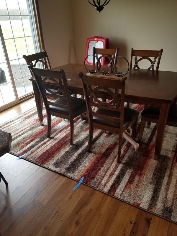 Dining room rug- excuse small child hiding