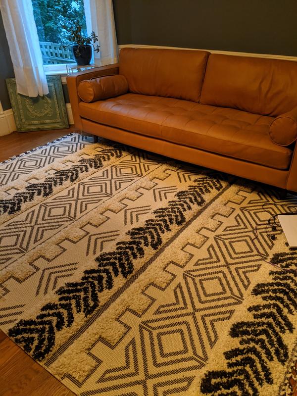 First piece in new living room. Colors are dark gray and cream.