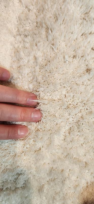 Fibers coming out. See length difference on finger