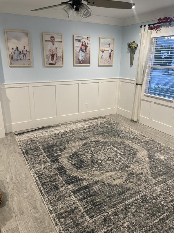 Much darker. No blue hues, all gray and charcoal.