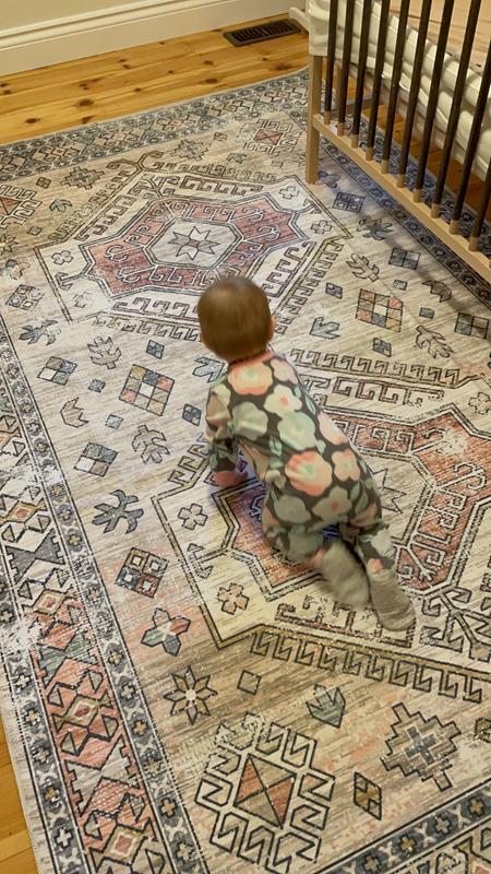 Inspecting her new rug :)