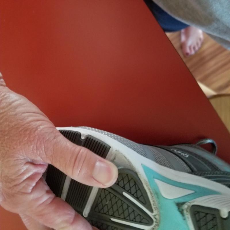 Black Strips on bottom coming off