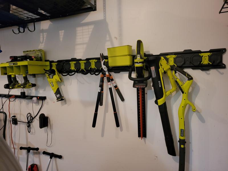 Hang ryobi lawn mower on wall hotsell