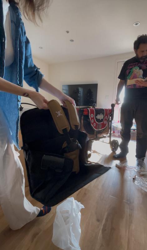Photo's show detachable buckle system seats, my son climbing into the wagon by himself and not tipping over, the photo of him seated shows how roomy it is and the height you have with storing under the seat