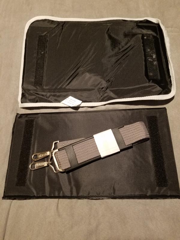 Velcro for extra security and nice large strap!