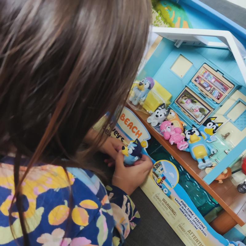 Adding all her other Bluey figures before the cabin is out of the box
