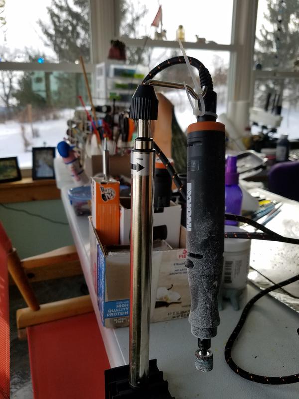 Got a tool hanger for it, box behind it holding the diff tools (I made)Q what is the easiest way to get the sanding dish on the burr or bit?  Also battery works great.
