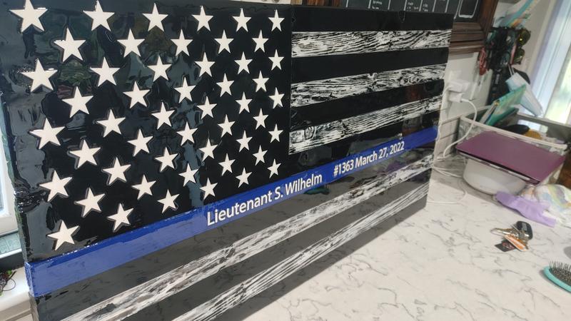 Reclaimed wood flags with epoxy pour. Painted with air brush and used heat gun for epoxy bubbles.