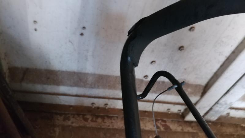 Foam handle grip has moved up & left and split open.