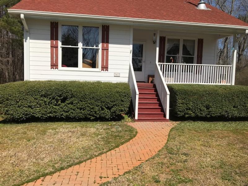 Hedges in right were trimmed; on left not trimmed yet.