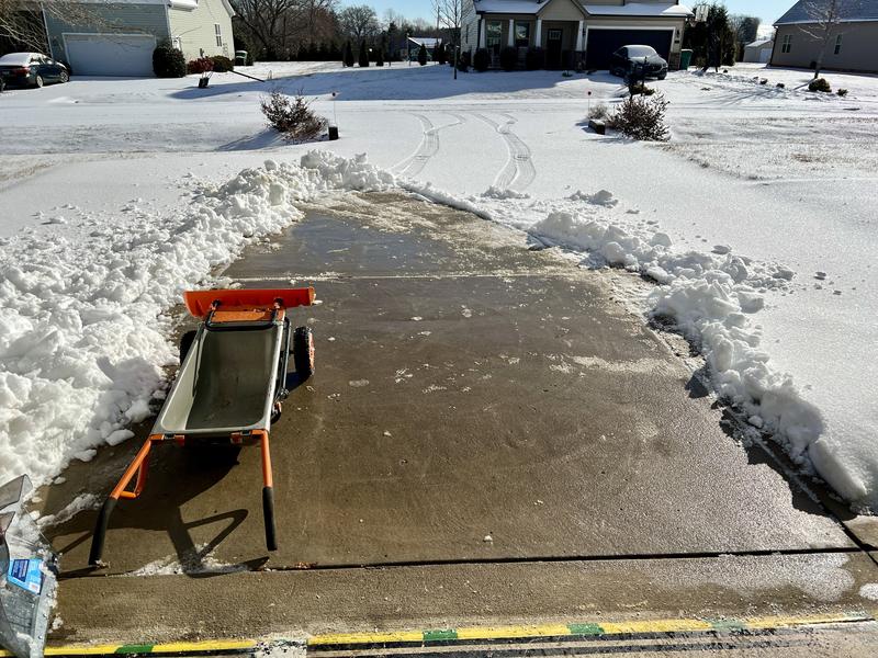 The snow was only 2” deep on a flat concrete driveway but the plow attachment still bent.