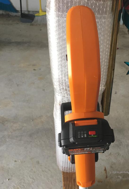 by touching the red button on the back, you can see how much power is left in the battery.