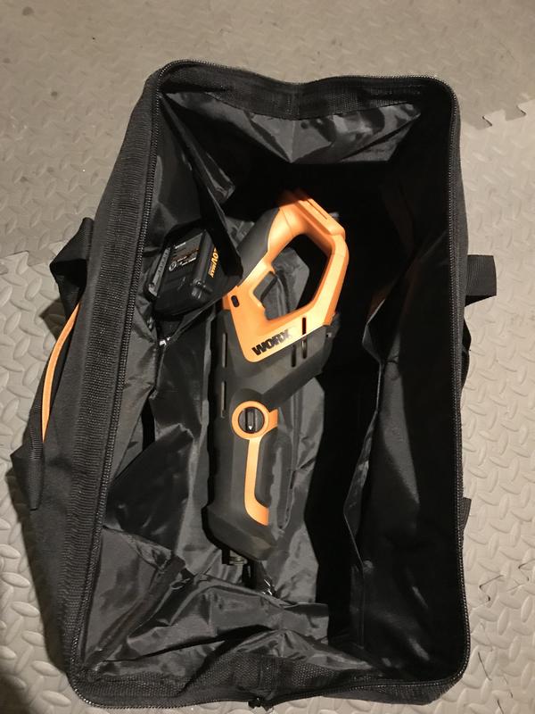 Reciprocating saw fits easily with room for batteries charger and blade.