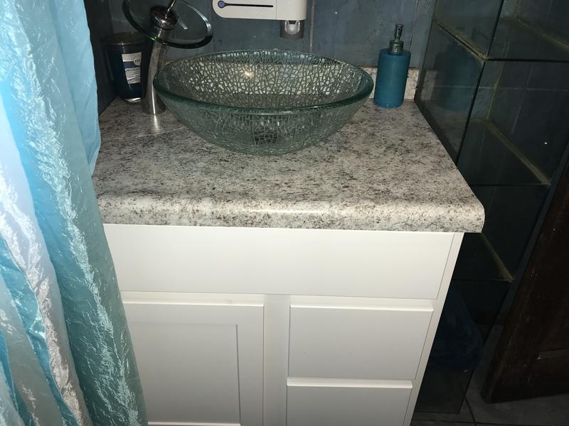 My plumber left me with a cheap vanity & top