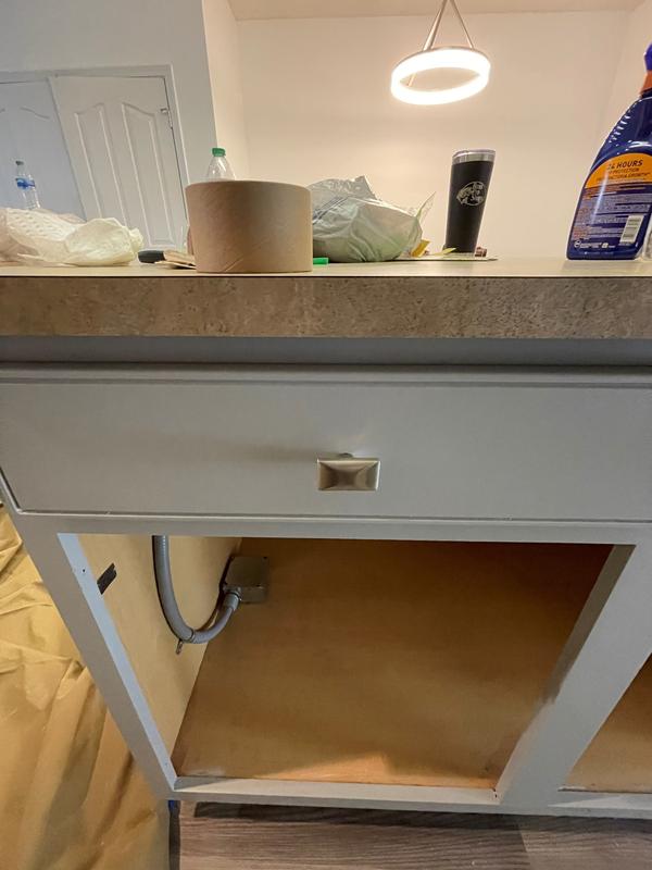 Close up of a drawer after it was spray painted gray