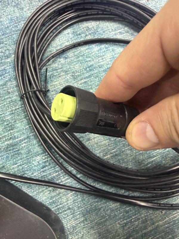 Cables from charging pad to wall outlet use some solid little waterproof connectors. Not worried about the rain.