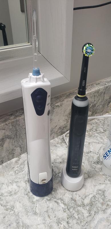 Next to Oral B brush.