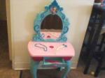 frozen singing vanity