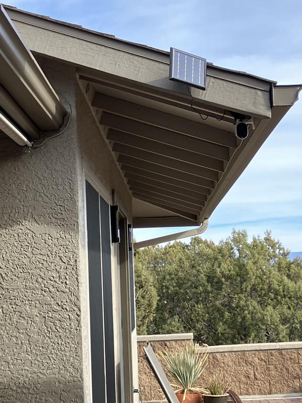 Eave mount of solar panel for camera