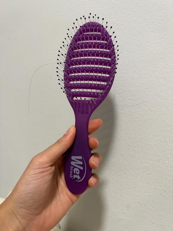Customer photo for "Cuts drying time and detangles effortlessly"