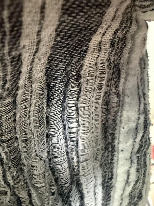 Customer photo for "Poor quality, runs in fabric after 1 wear"