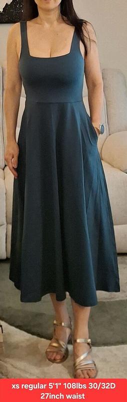 Customer photo for "Tight around the chest and very low cut"