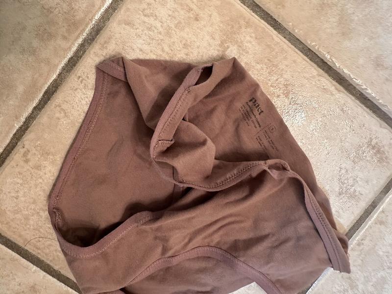 Customer photo for "Weak lining. Fabric feels great"