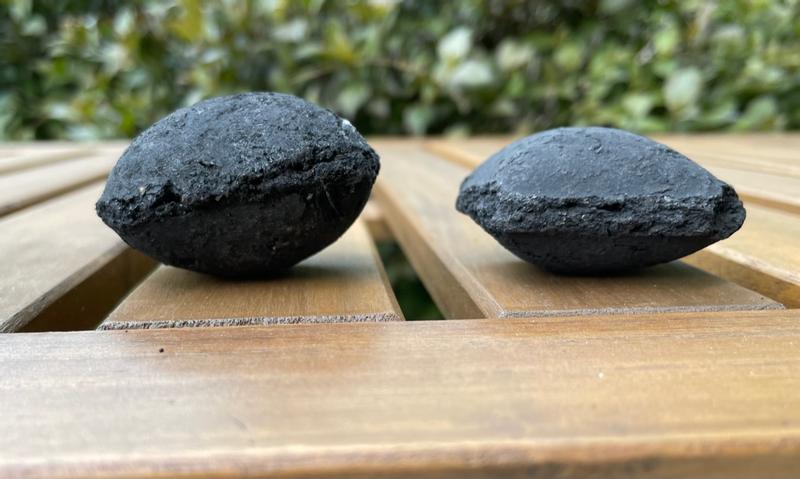 Weber briquette from 2022 on the left.  Weber briquette from 2023 on the right.
