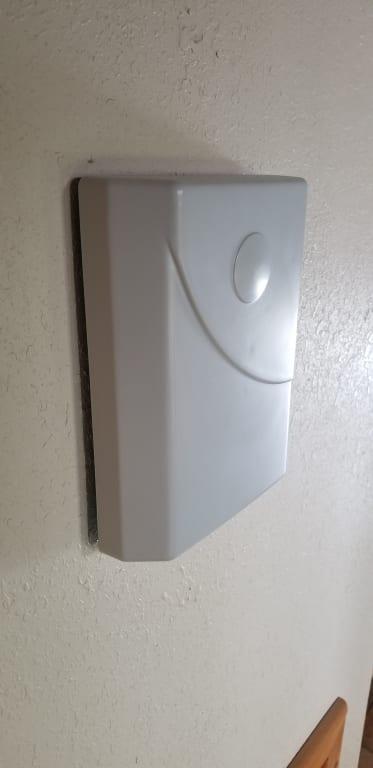 Interior booster mounted on wall