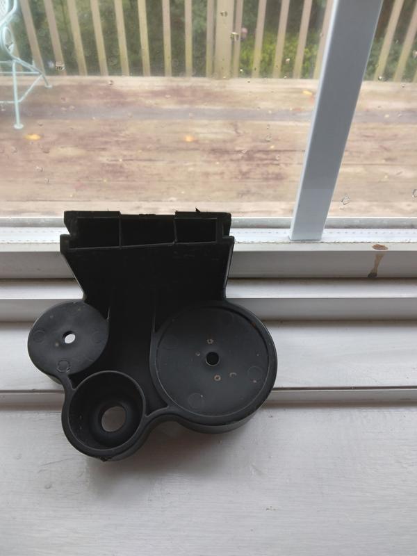 This is the lower gun holster that appears to have an uneven edge like something may have broken off during shipping.