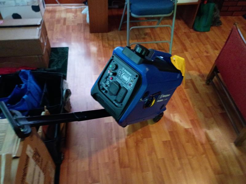 Handle and built-in wheels made it easy to move generator to outdoor operating position