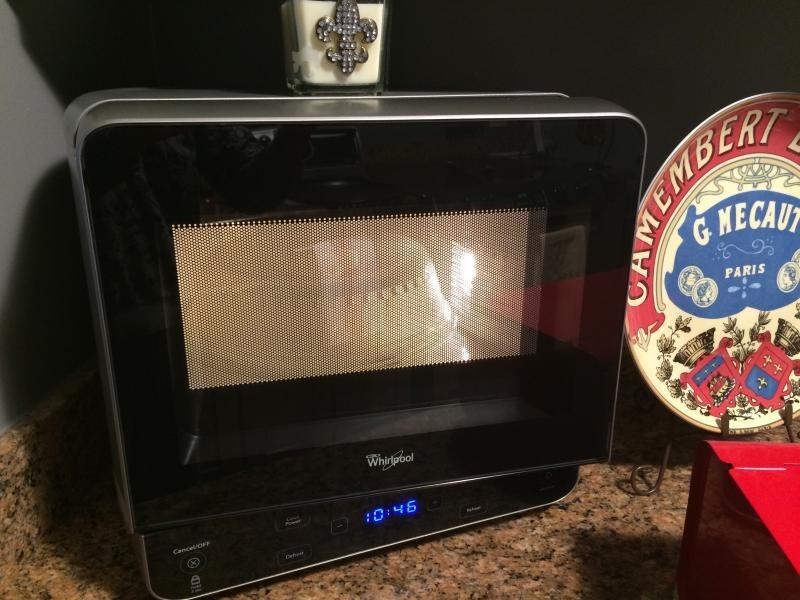 White 0 5 Cu Ft Countertop Microwave With Add 30 Seconds Option