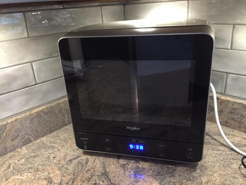 White 0 5 Cu Ft Countertop Microwave With Add 30 Seconds Option