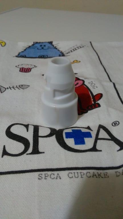 The crack line is at the centre of the base, with a slight chocolate tint.