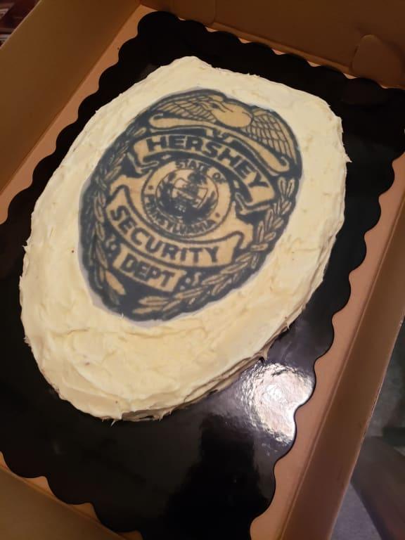Grooms cake shaped like security badge