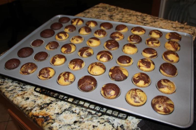 Mini Cupcakes made with 1 box of cake mix. Used parchment paper mini liners.