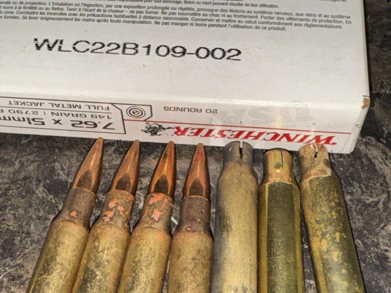 Rust or some type of discoloration.  Split necks after firing.