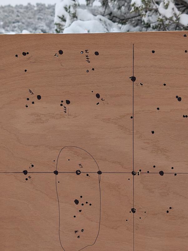 Top middle group. Tested several types of 17 hmr ammo