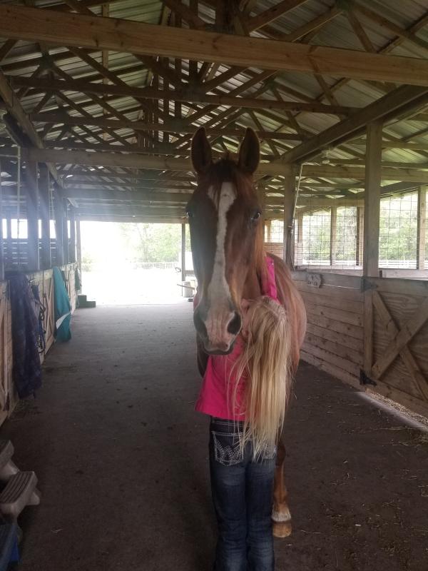 Shelby's Wranglers work perfect for her and her horse.