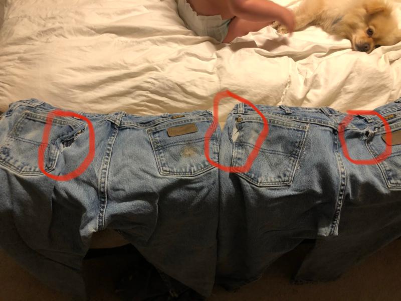 3 rips and one pocket I had a friends mom sow up.