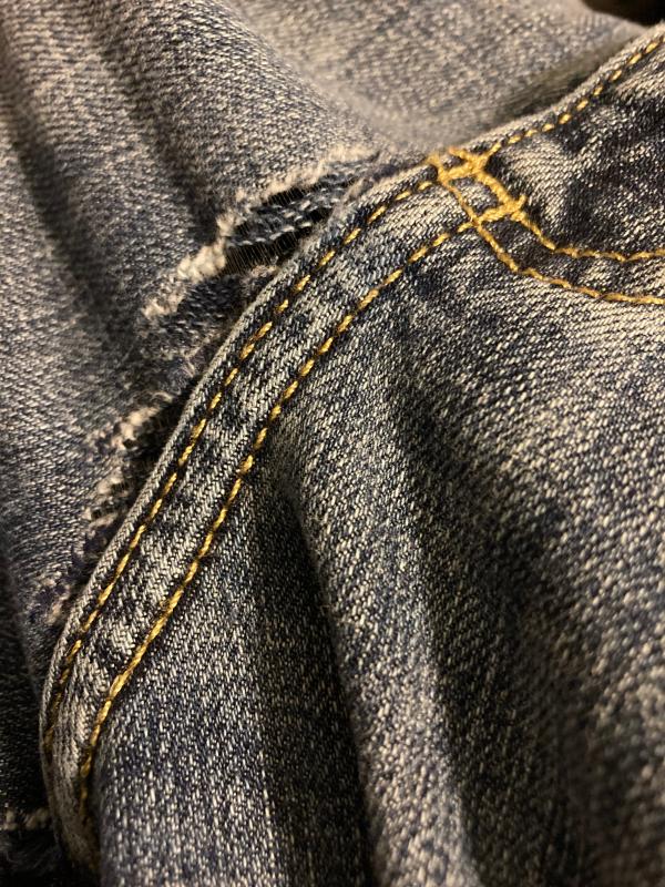 Customer photo for "Split at the zipper seam, first time wearing."