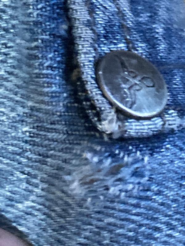 split in the crotch and at the rear pocket