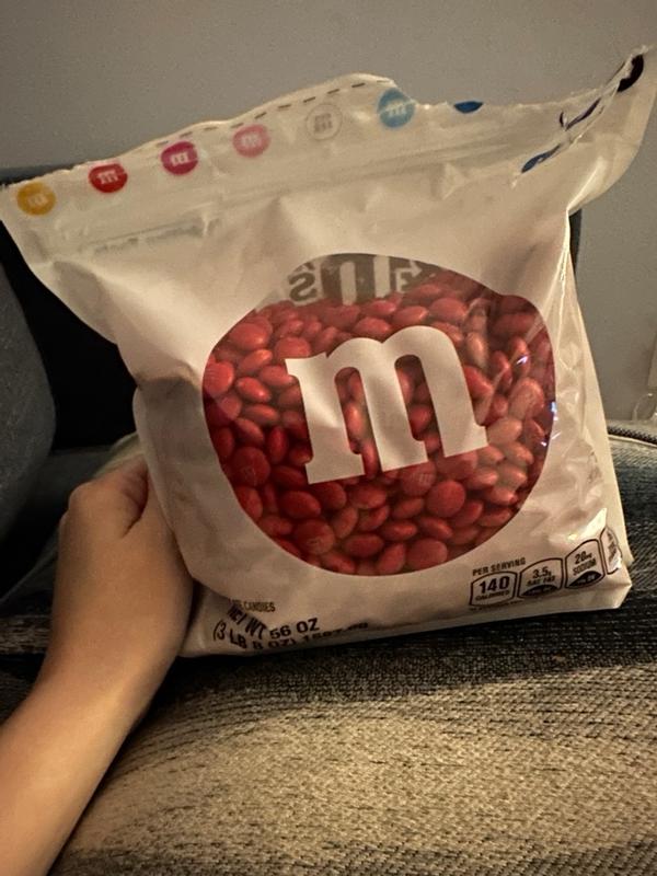Idiot takes on a 3.5 lb. party bag (56 oz.) of chocolate M&Ms