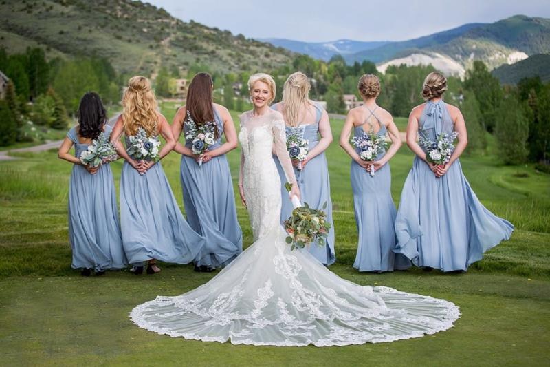 second from the left (blonde)